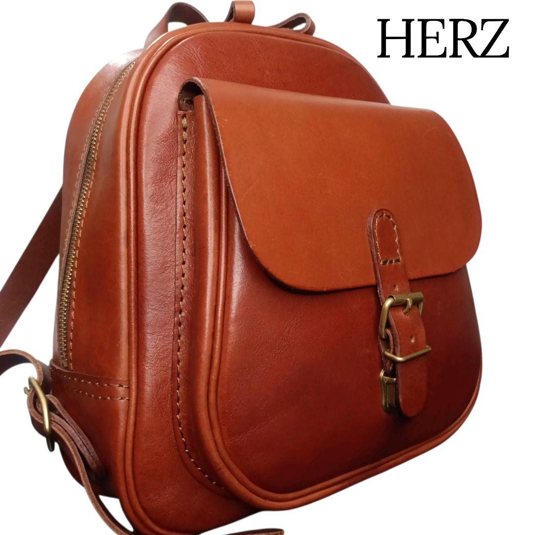 現行✨HERZ コロンとした可愛いフォルムの前ポッケミニリュック R20 チョコ 現行✨HERZ コロンとした可愛いフォルムの前ポッケミニリュック R20